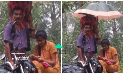 Seorang Bapa Sanggup Berdiri Pegang Payung Demi Lindungi Anak Ketika Kelas Online Dalam Hujan Lebat